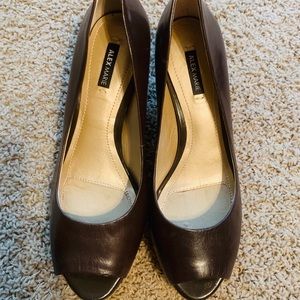 Brand new..never worn ..Peep toe brown pumps